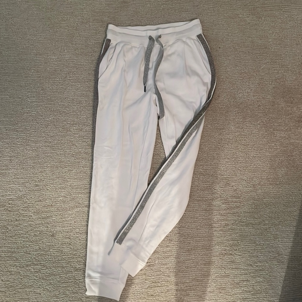 White Rails joggers with shiny stripes down leg